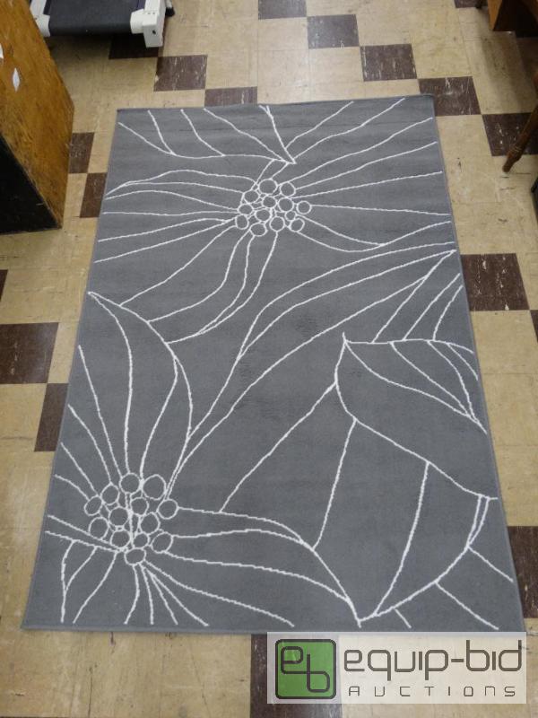 lot 579 image: Gistev 4 x 6 greywhite area rug from Ikea....