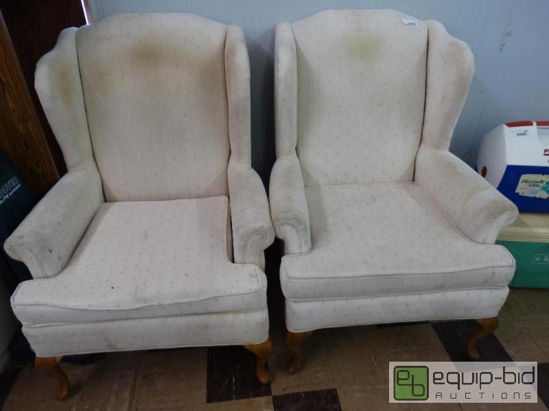 lot 662 image: 2 cream color wingback chairs....