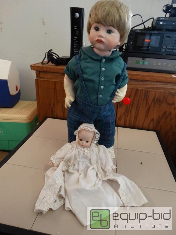 lot 664 image: Little boy and baby porcelain dolls....
