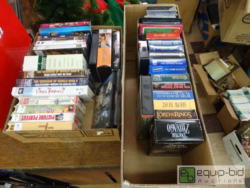 lot 667 image: Large lot of VHS &amp DVD movies. Over 40....