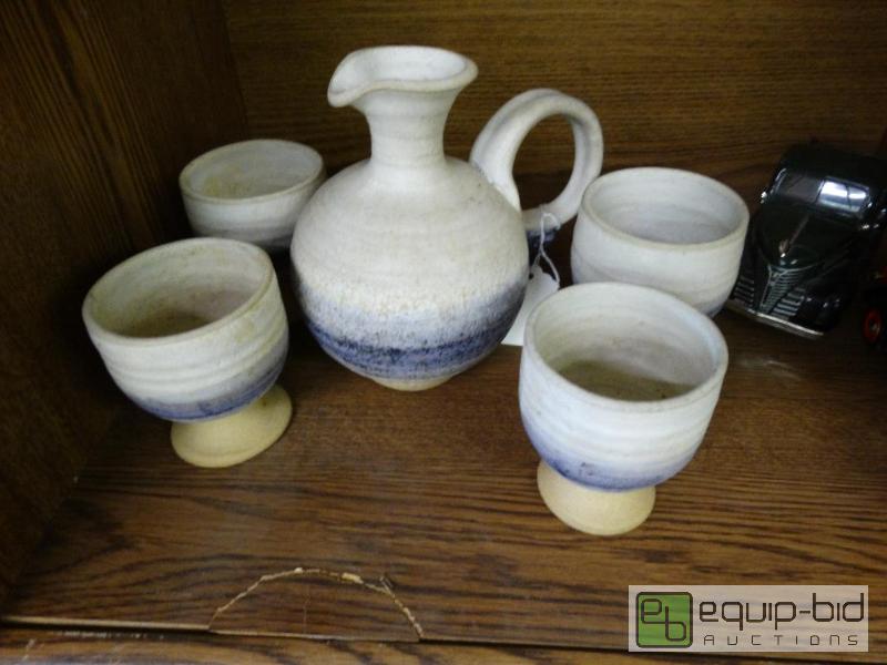 lot 1017 image: Pottery set Pitcher &amp 4 Cups....
