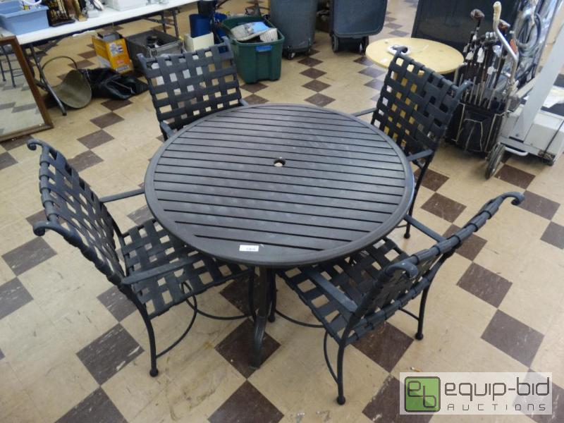lot 873 image: 48 Round Black Metal Patio Table W4 Chairs....