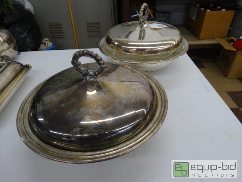 lot 915 image: 2 Round Silver Plate Severs WLids....