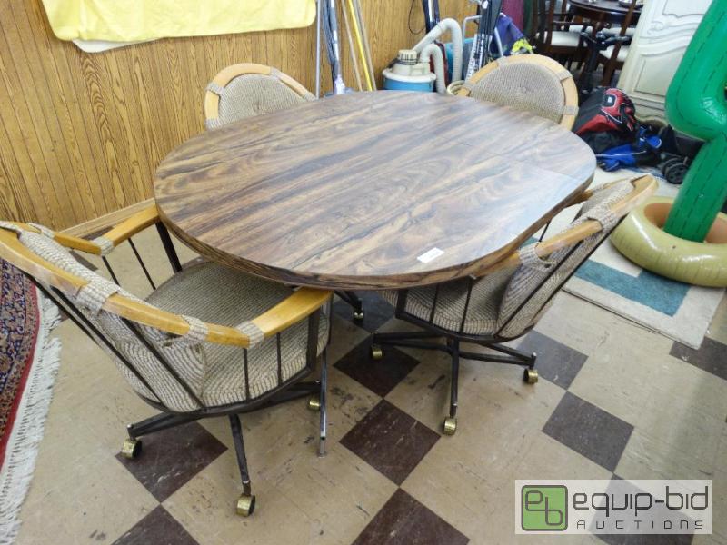 lot 960 image: oval Dining Table W1 leaf And 4 Swivel Chair...