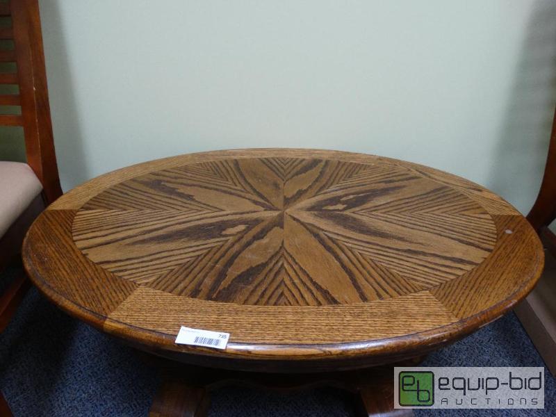 lot 735 image: Oval Wooden Coffee Table....