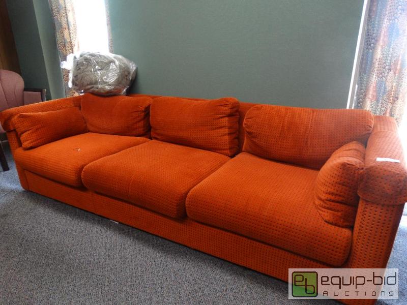lot 779 image: Orange Couch....