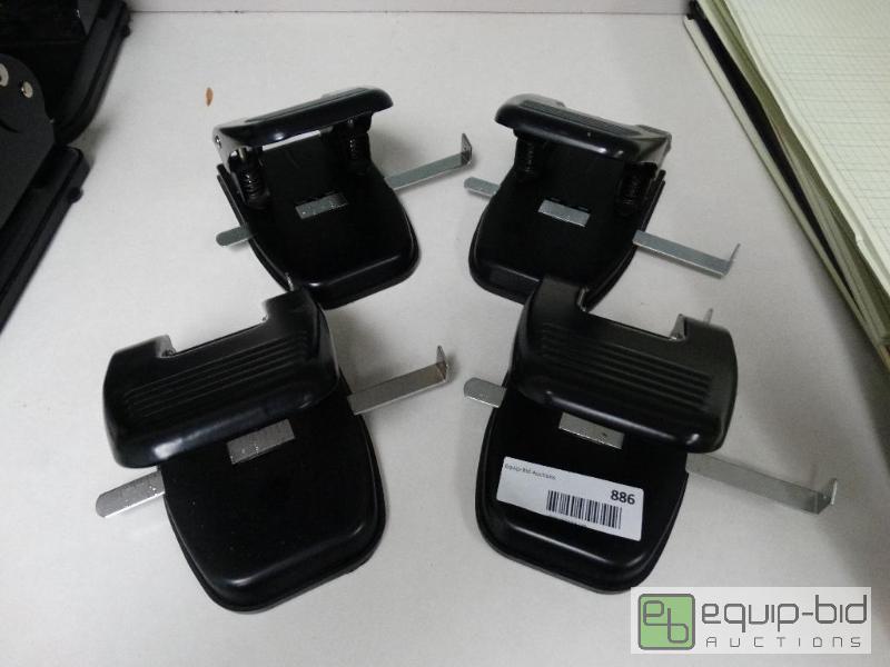 lot 886 image: 4 Office Depot Black Hole Punchers....