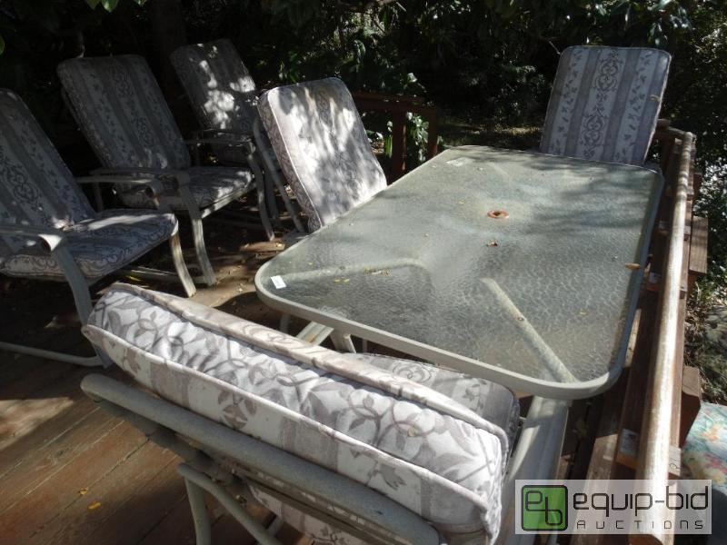 lot 2248 image: Patio table with 6 chairs and cushions....