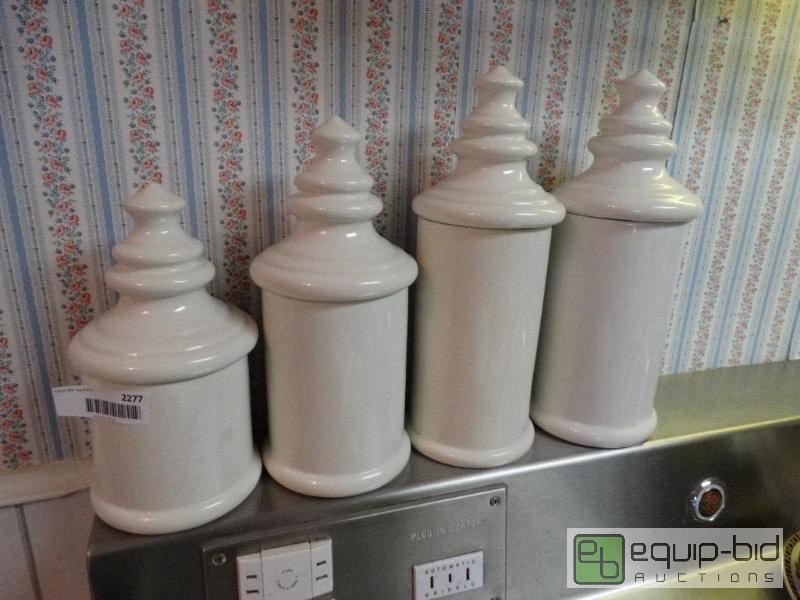 lot 2277 image: Set of 4 tall white cannisters....