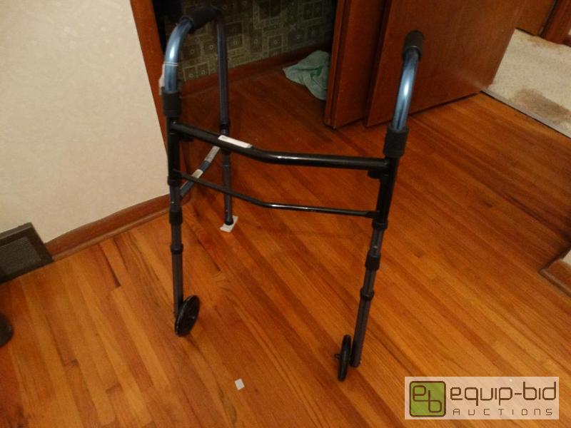 lot 2295 image: Medline blue folding walker....