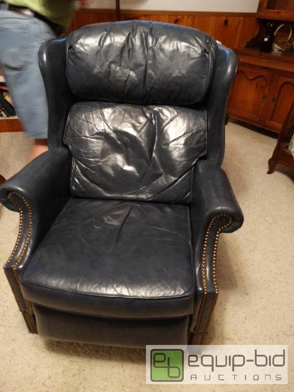 lot 2311 image: Blue leather wing back recliner with nail hea...