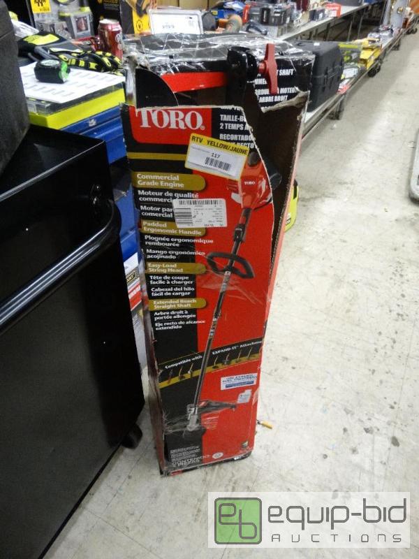 lot 117 image: Toro 2 Cycle Straight Shaft Weed Trimmer....