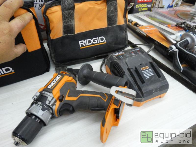 lot 208 image: Ridgid 18 Volt Brush Less Hammer Drill WChar...