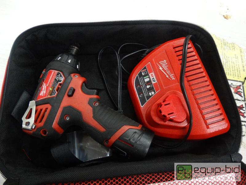 lot 265 image: Milwaukee Screw Driver WBattery &amp Case....