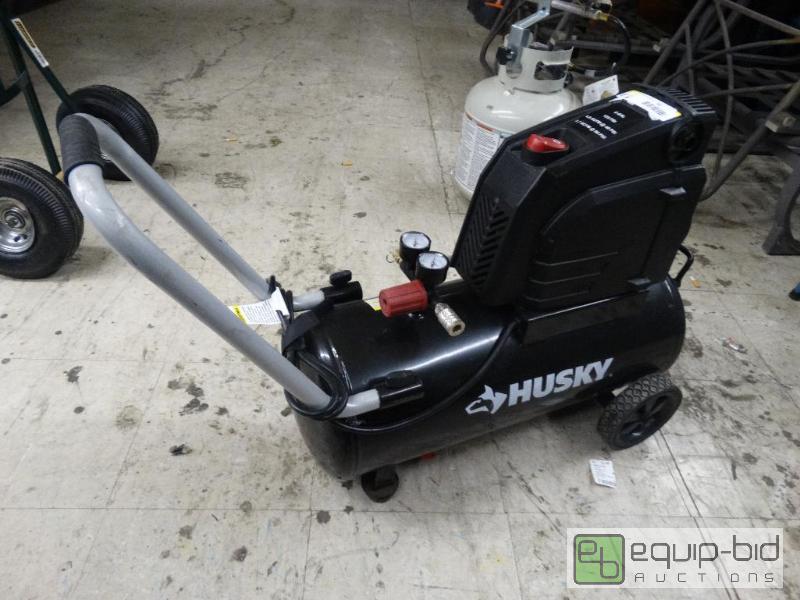 lot 91 image: Husky 8 Gallon 135 PSI Air Compressor On Whee...
