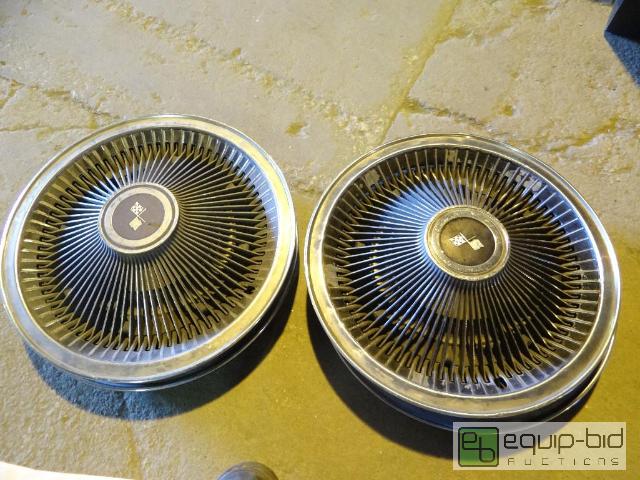 lot 2113 image: Set of Vintage Corvette Origanal Hub Caps