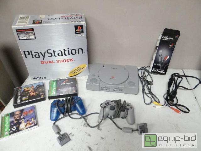 lot 2135 image: PlayStation Game Console System w Controlers And Games